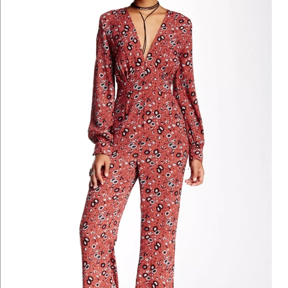 Free people some like it hot jumpsuit size 4